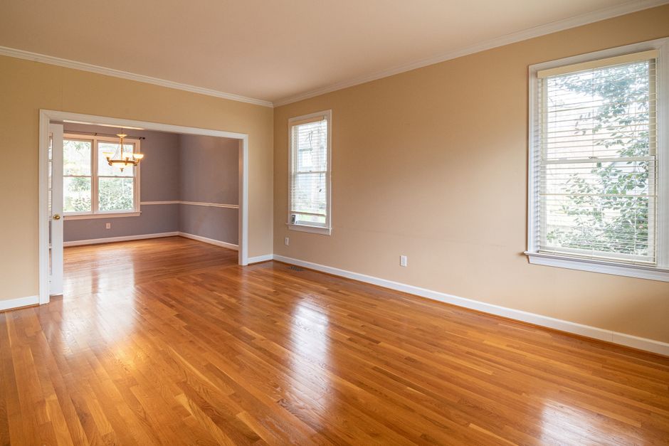 A refinished hardwood floor in a cozy living room